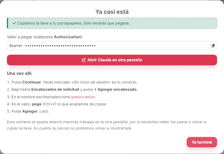 El asistente crea la llave, la copia al portapapeles y deja los pasos a la vista mientras trabajas en la otra pestaña.